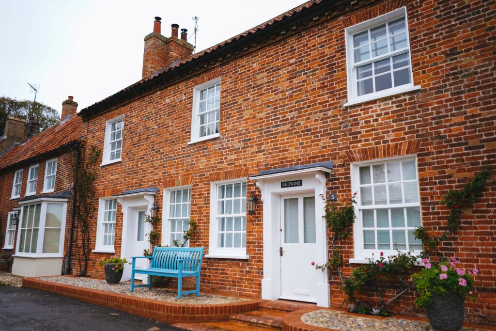 A suburban semi-detached house on a street in the UK.