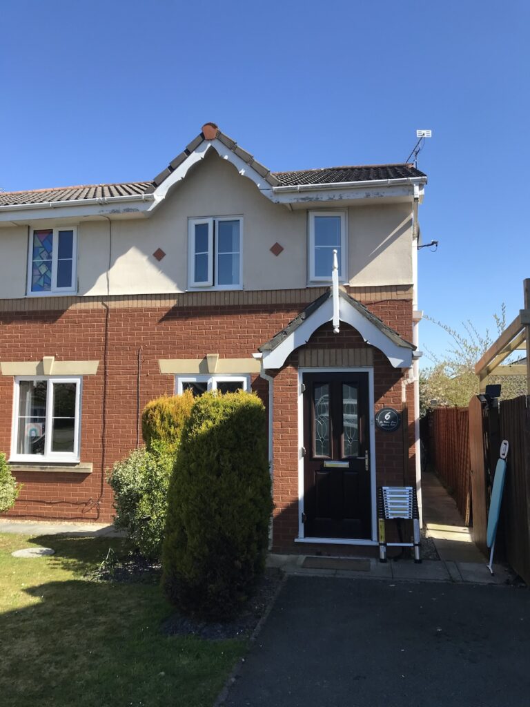 A typical modern house in a suburban UK setting.