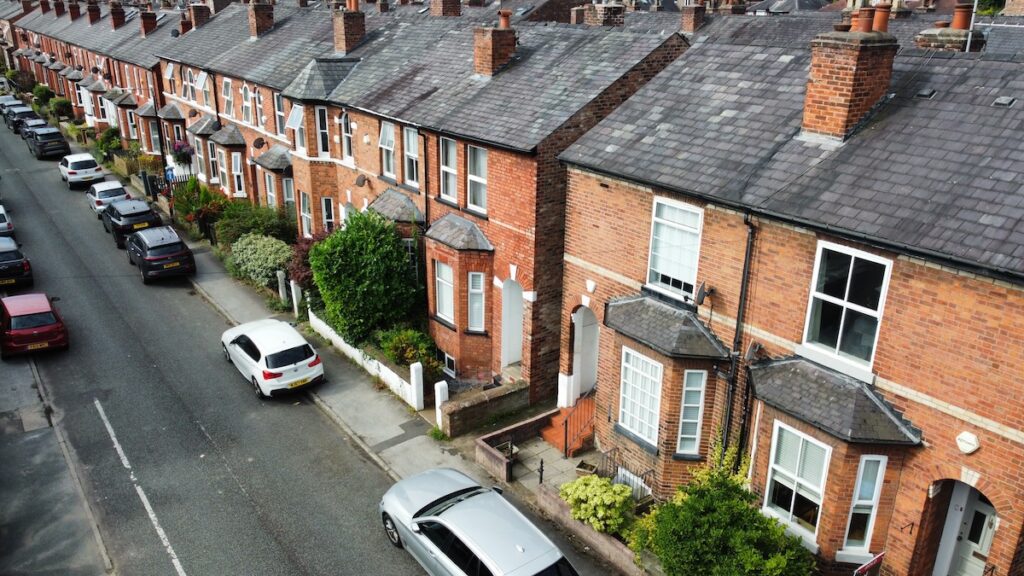 A row of houses seen from above, on a suburban English street.