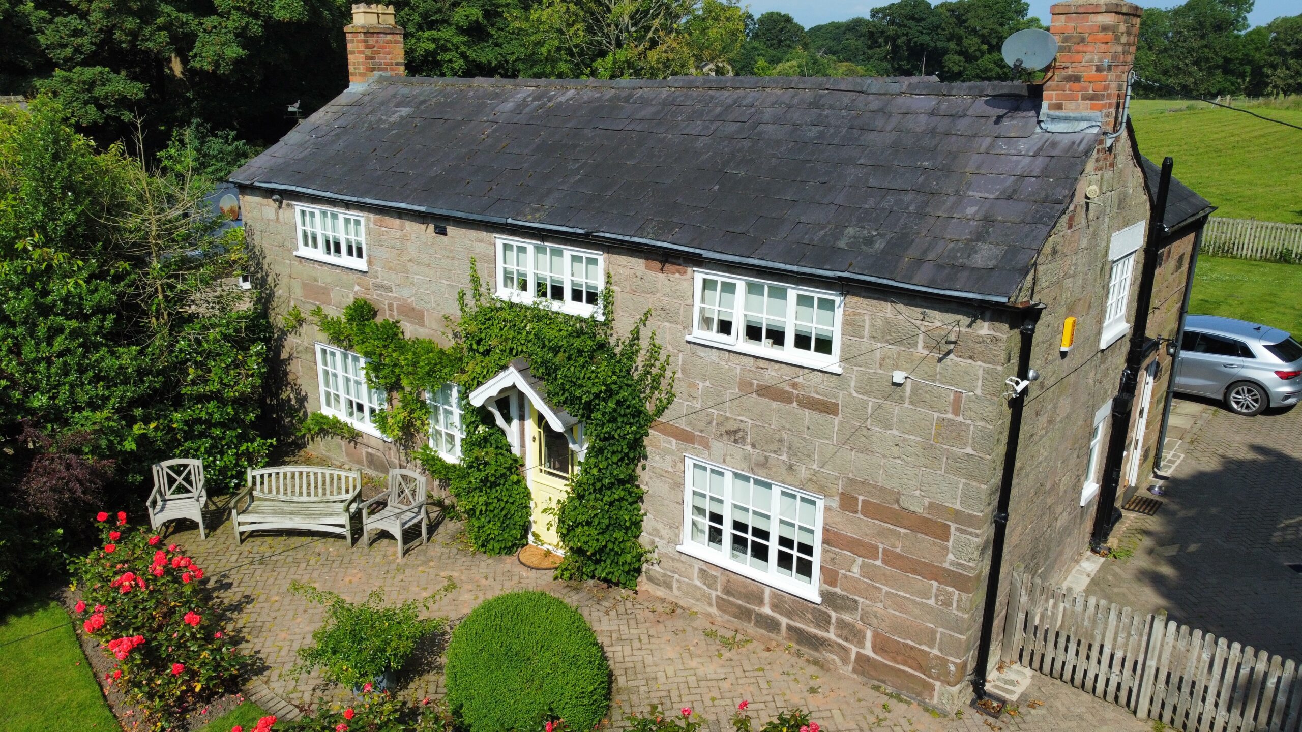 Drone view of old cottage house survey