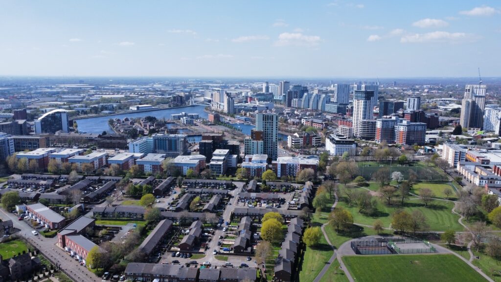 An aerial drone shot of the Manchester skyline.